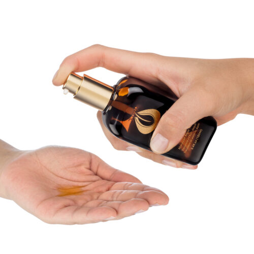 Argan oil product in hand